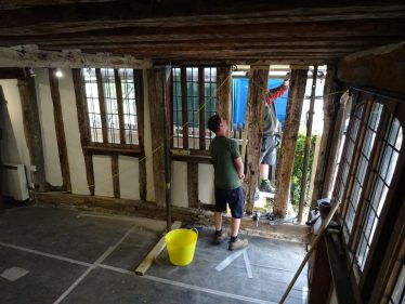 stripping out the plaster to reveal the problems